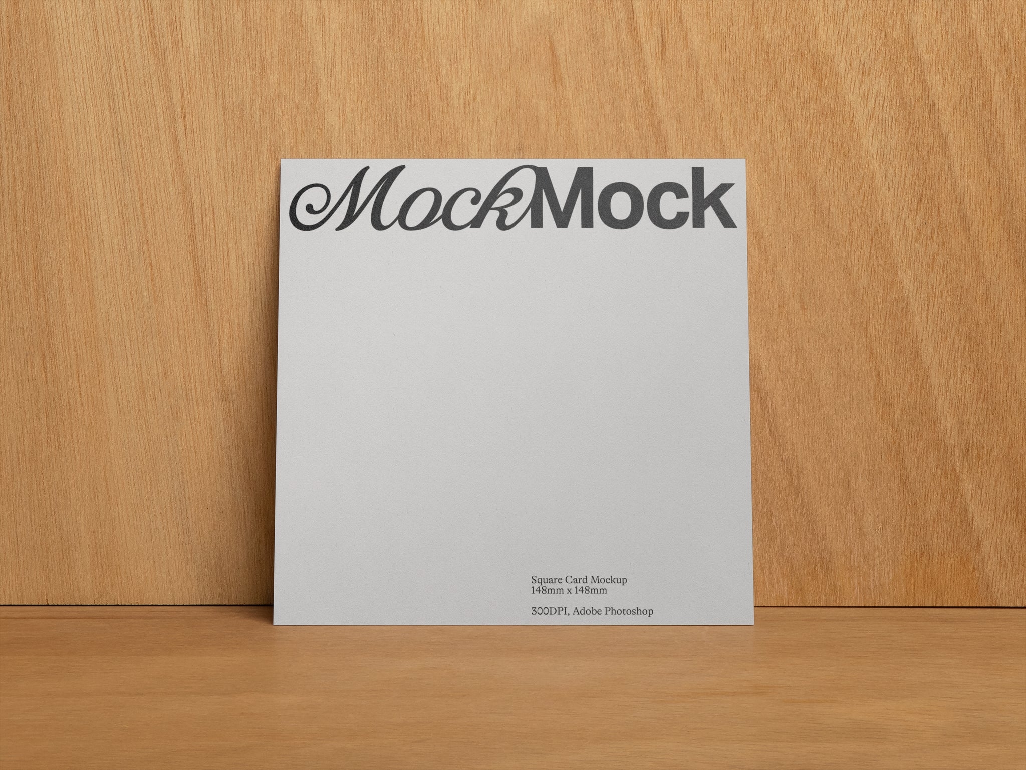 Square Print Mockup standing against a wooden background