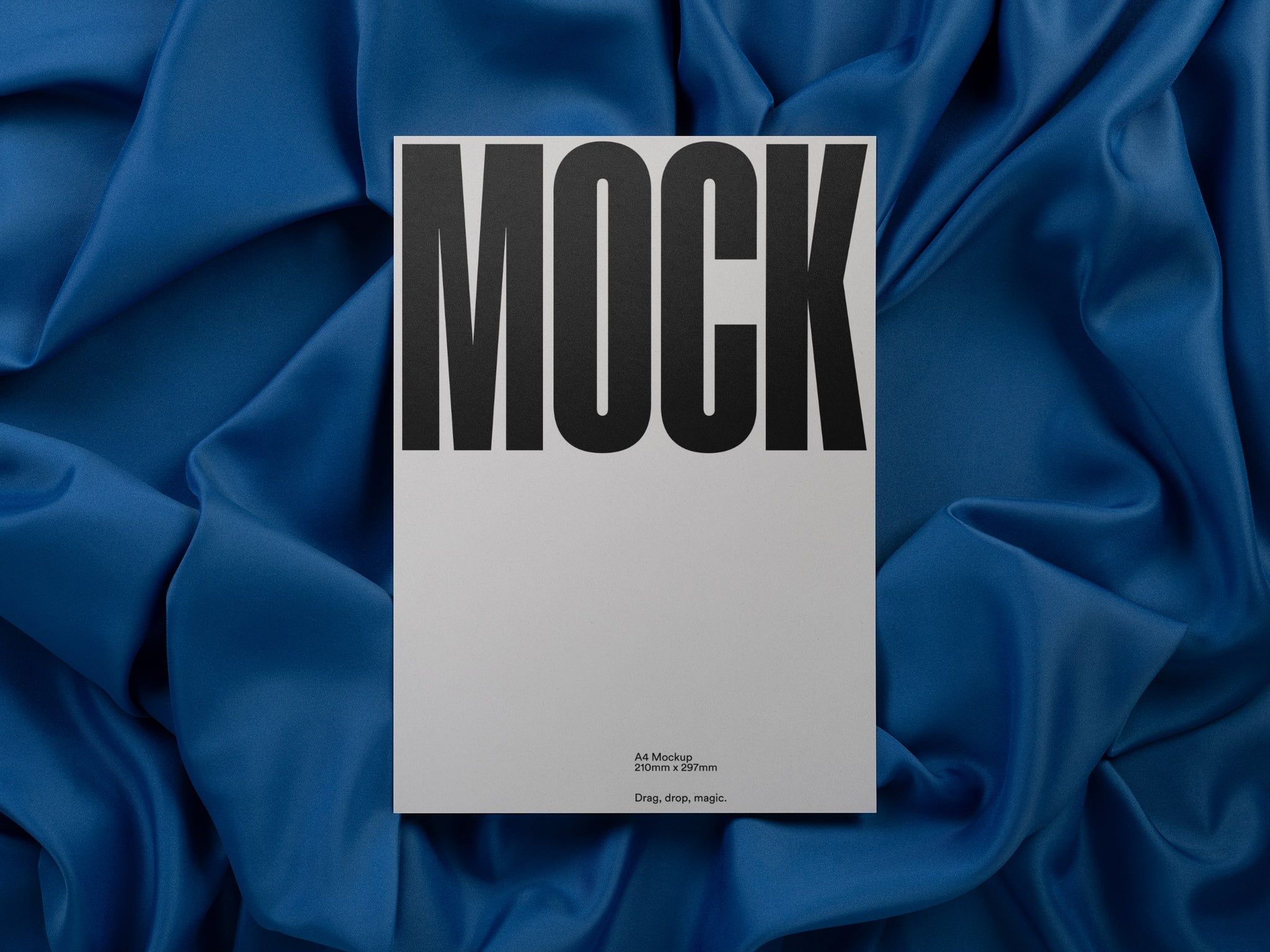 Branding mockup featuring stationery print items, showing a poster design on a blue background made of cloth fabric. Created by Sylvan Hillebrand.